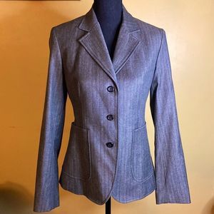 Express three button grey stretch blazer jacket. Two side pockets, lined inside.
